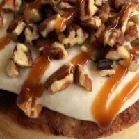 Caramel Pecan Roll* · caramel frosting topped with pecans and caramel sauce