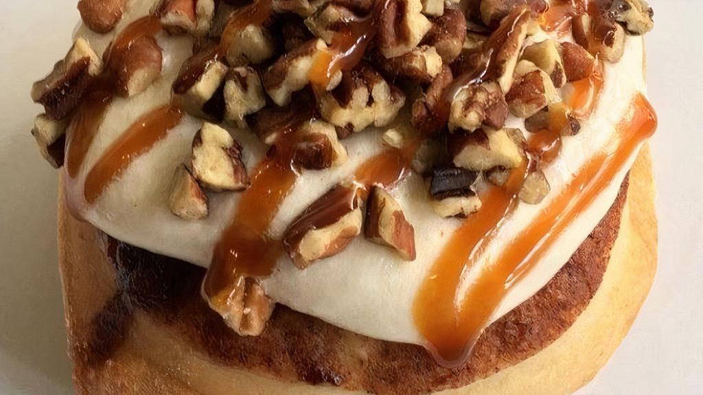 Caramel Pecan Roll* · caramel frosting topped with pecans and caramel sauce