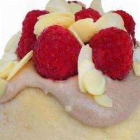 Raspberry Dream Roll* - Raspberry Dream Roll · chocolate frosting topped with almonds and fresh raspberries