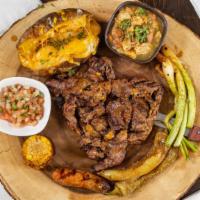 Carne Asada · Premium ribeye steak epazote marinated, charred chiles with charred Mexican green onions, an...