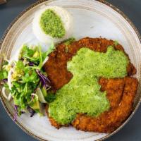 Pollo Milanesa · Pan seared breaded chicken, covered with pipian sauce. Served with arroz blanco and fennel a...