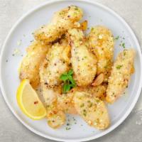 Garlic Parm Wings · Fresh chicken wings  fried until golden brown, tossed in garlic parmesan sauce.