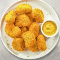 Clueless Nuggets · Bite sized nuggets of chicken breaded and fried until golden brown. Served with your choice ...