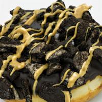 Old Dirty Bastard · Raised yeast doughnut with chocolate frosting, chocolate cream-filled cookies, and peanut bu...