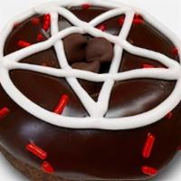 Diablos Rex · Chocolate cake doughnut with chocolate frosting, red sprinkles, a vanilla frosting pentagram...