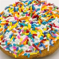 Sprinkle Cake · Plain cake doughnut with vanilla frosting and sprinkles