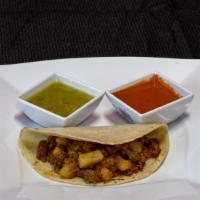 Picadillo (Ground Beef & Potatoes) · **All tacos have refried beans