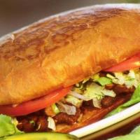 Tortas (Bolillo Bread Sandwich) · With refried beans, choice of meat, lettuce, tomatoes, onions, avocado slices, Monterey Jack...