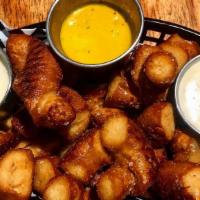 *Pretzel Bites &  Cheese · (2) Jumbo soft Pretzels, chopped & deep fried, served w/ 5oz of Guinness beer cheese & musta...