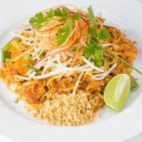 Pad Thai Noodles · Stir fried thin rice noodles, tofu, eggs, scallions, bean sprouts, and crushed peanuts in a ...