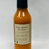 Bottled Mango Habanero Hot Sauce · Organically grown habanero peppers to ripe. Once harvested we blended with ripe Thai mangos ...