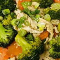 Chicken & Broccoli · Stir-fry chicken, broccoli and carrots in a light brown sauce. Served with white rice.