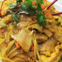 Yellow Noodle · Stir fried flat noodles, eggs, celery, onions, and carrots in yellow curry powder.