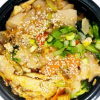 Sesame Stir Fry Noodle Bowl · Stir fry noodles topped with broccoli, cabbage, carrot, baby corn, celery, and bok choy in a...