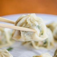 Pork Dumplings (10) · 만두. Ten (10) pieces of freshly steamed homemade dumplings with juicy pork and vegetables. Ma...