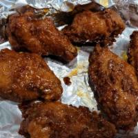 Chicken Wings (6 Pieces) · Choose from BBQ, Buffalo, Sweet crunchy chili garlic & Cajun Seasoning - Dry Rub