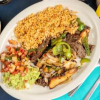 The Original Fajitas · Strips of beef, chicken, or a combination of both grilled with onions and bell pepper.