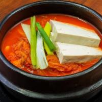 Kimchi Stew (Kimchi Jjigae) · Hot. Kimchi jjigae - a spicy kimchi stew with firm tofu and assorted vegetables.