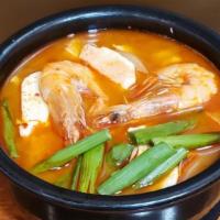 Seafood & Soft Tofu Stew (Haemul Soondubu) · Hot.  Haemul soondubu - a spicy soup with assorted seafood,  vegetables, and soft tofu.