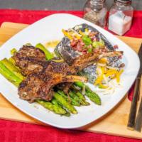 Lamb Chops  · Grilled seasoned Lamb Chops served with 2 sides. Your choice of Asparagus - Baked potato - C...