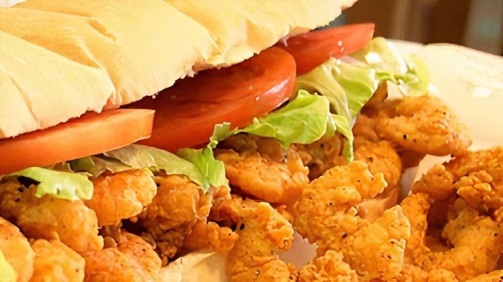 Poboy Sandwich · Fried Shrimp, Chicken, or Fish on a toasted buttered bun with your choice of cheese, lettuce tomatoes & pickles.