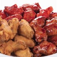Traditional Wings (40 Pieces) · Our wings are always fried to perfection, come tossed in your choice of Krispy, traditional ...
