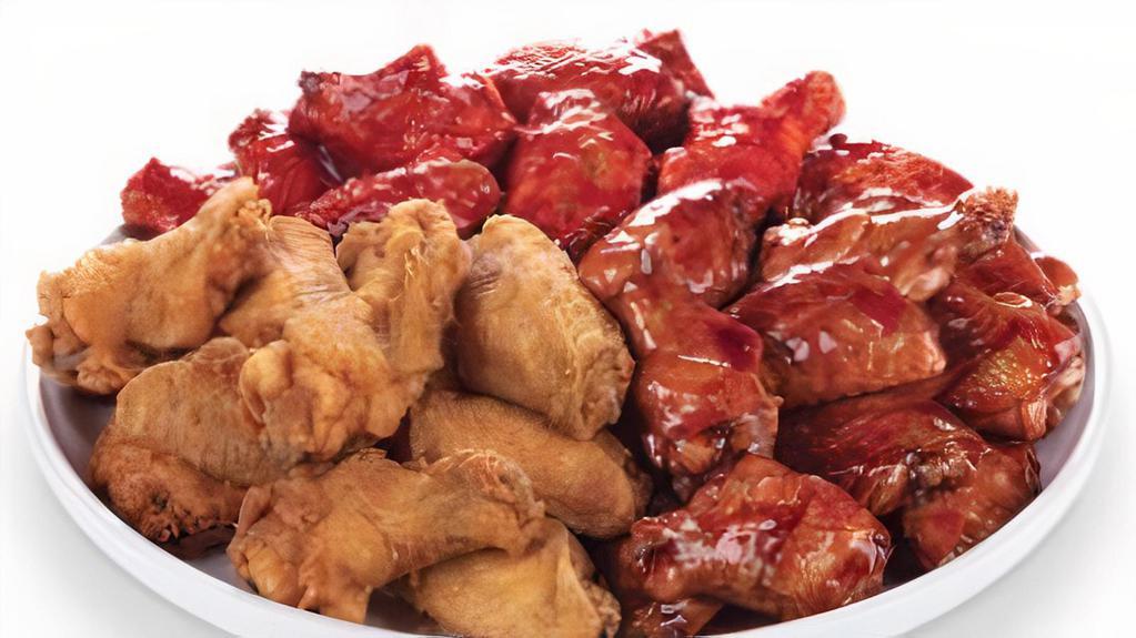 Traditional Wings (40 Pieces) · Our wings are always fried to perfection, come tossed in your choice of Krispy, traditional hot, and sweet & sour sauces.