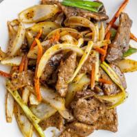 Mongolian Beef · Hot and spicy. Sliced beef cooked with onions, carrots and scallions in spicy brown sauce.