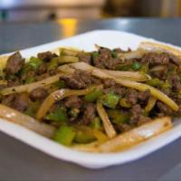 Alambre Sin Queso · Deliciosa carne de res, con cebolla y chile morrón. (Orden con 8 tacos) / Sweet beef with on...