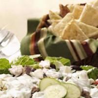 Chicken Shawarma Salad · Combination of shredded iceberg lettuce, tomatoes, cucumbers, onions, tzatziki, feta cheese ...