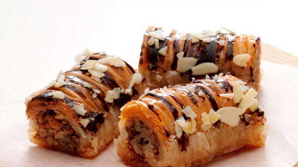 Baklava Nut Roll · A sweet crunchy, one baklava roll with walnut, almond and chocolate.