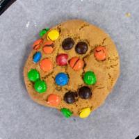 M&M Cookie · Butter cookie with a touch of brown sugar with m and m topping.