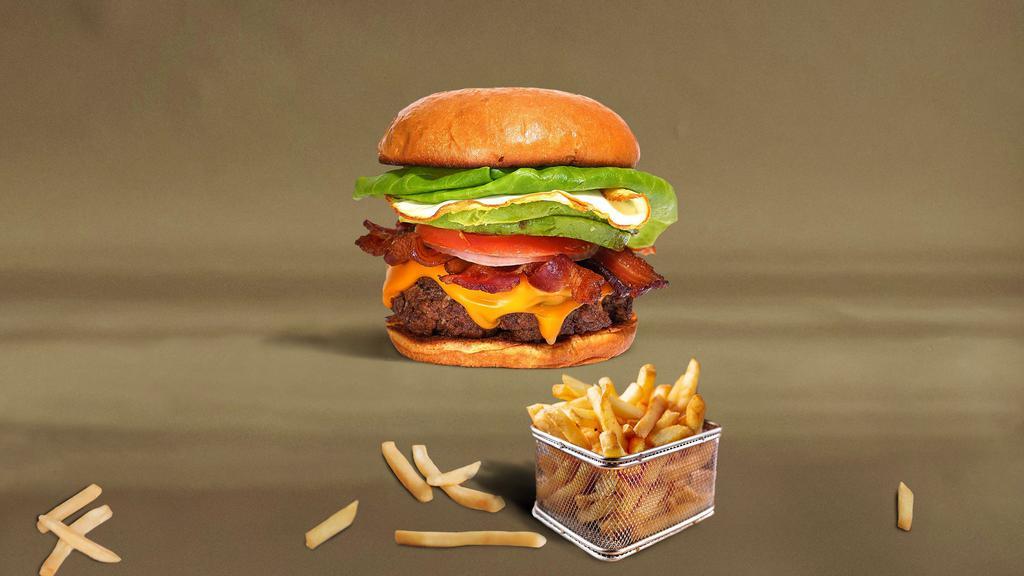 Break Of Dawn Burger · American beef patty topped with turkey bacon, fried egg, avocado, melted cheese, lettuce, tomato, onion, and pickles. Served on a warm bun.