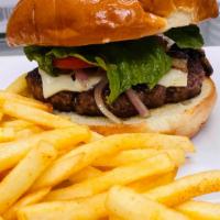 Mushroom Swiss Burger · Burger with swiss cheese, grilled mushrooms, onions served with fries.