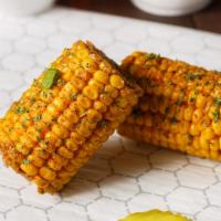 Buttery Smoked Seasoned Corn On Cob · Buttery smoked seasoned corn on cob