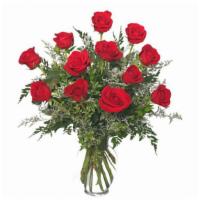 Classic Dozen Roses · Classic Urn Vase  Foliage: Leather Leaf, Myrtle   Red Roses   Misty Blue Limonium.

This vas...