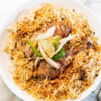 Chicken Biryani · Finest basmati rice combined with tender pieces of chicken and a touch of curry sauce garnis...