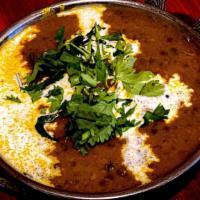 Dal Makhani · Creamed black lentils with spices.
