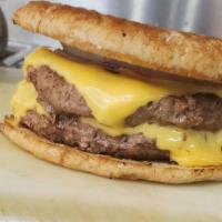 Double Burger/Cheese Burger · Burger has a hint of mustard, leaf lettuce, hint of mayo, hidden grilled onions, tomato slic...