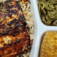 Grilled/Blackened Salmon Plate · Over a bed of seasoned rice, sautéed veggie blend, and corn