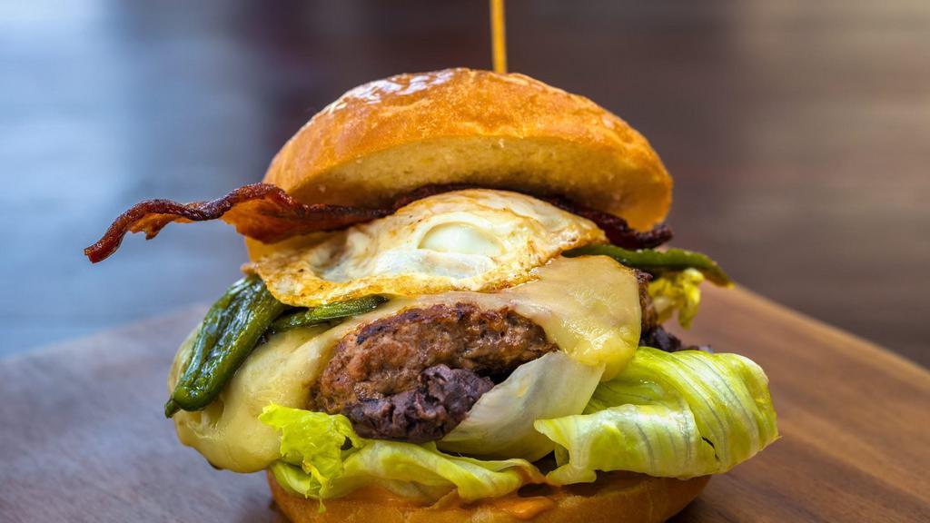 Mercedes Bunz · House Beef, Chipotle Mayo, Lettuce, Refried Beans, Pepper Jack Cheese, Roasted Poblano Pepper, Egg & Bacon