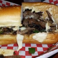 Beef Philly · Roast beef, sautéed onions, mushrooms, bell peppers, mayonnaise, and provolone cheese.