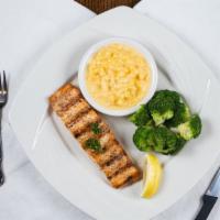 Grilled Salmon · Grilled salmon fillet with lemon butter sauce. (extra lemon butter for an additional charge).