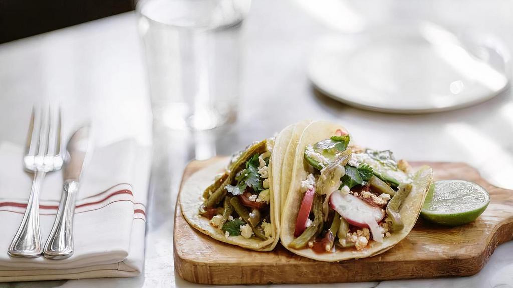 5 X Nopales Cactus Taco - Vegan · 5 Tacos. Go green! These authentic street tacos have cactus, caramelized onions and tomatoes served on corn tortillas with a wedge of lime, cilantro, onion, and salsa on the side. Get all your antioxidants in these bites.