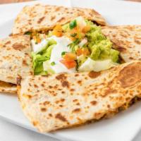 Quesadillas · All made with Monterey jack cheese served with guacamole, sour cream, and pico de gallo on s...
