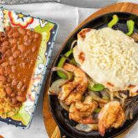 Pechuga Del Sol · Grilled chicken (with melted cheese on top) and shrimp served with rice, beans, guacamole, p...