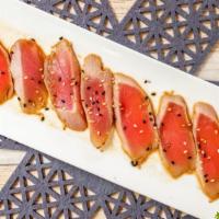 Tuna Tataki · Sliced seared tuna with ponzu sauce.