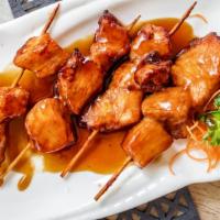Yakitori (3 Pcs) · Grilled chicken and vegetable on skewer with teriyaki sauce.