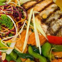 Ginger Salmon · Grilled salmon served with ginger, baby corn, onion, carrots, bell pepper, scallions, and mu...