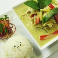 Green Curry · Green curry with bamboo shoot, eggplant, bell peppers, basil and coconut milk.<br />Served w...